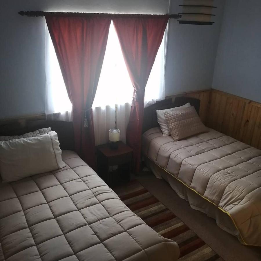 Hostal Y Cabanas Vientos Del Sur Puerto Ingeniero Ibanez Bagian luar foto